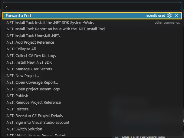 The VS Code Command Palette with Forward a Port at the top of the list, highlighted.